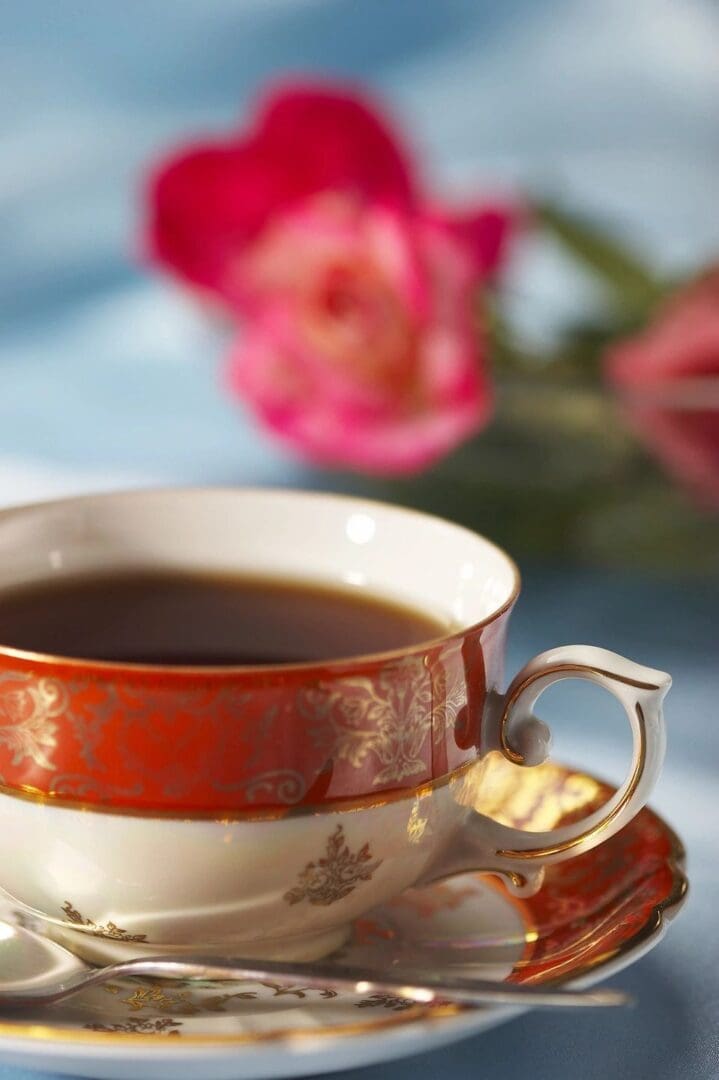 Black tea in the glass cup with saucer on display