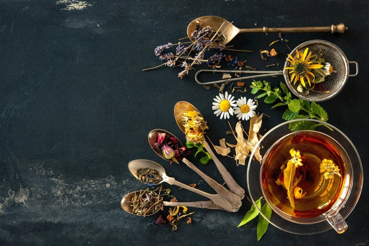 Herbal tea with various dried flowers.