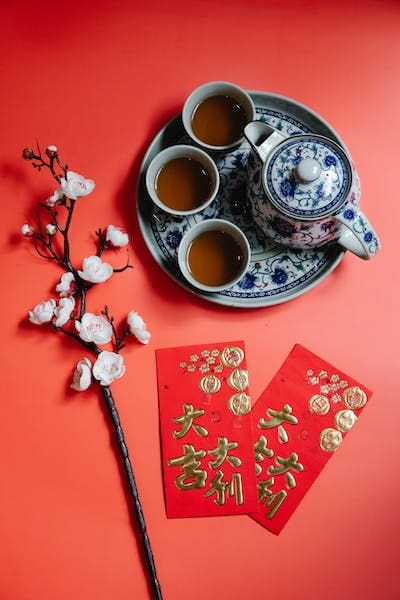 Chinese New Year tea ceremony with red envelopes.