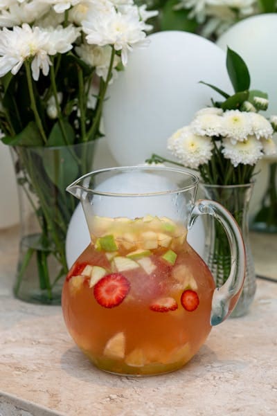 Fruit-infused drink in a pitcher.